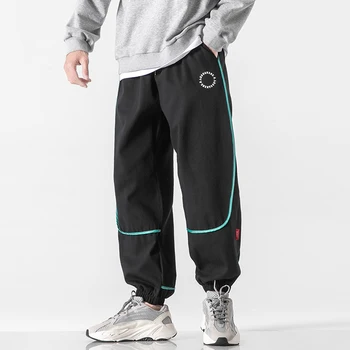 Ir 2021. Jaunu Modes Vīrieši Kravas Bikses Vīriešu Wied Kāju Bikses Streetwear Bikses Vīriešiem Gadījuma Jogger Harajuku Lielgabarīta Harēma Bikses S-5XL